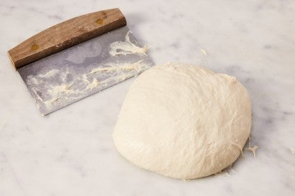 Wet bread dough on work surface